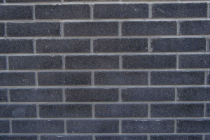 Облицовочный угловой вибропрессованый кирпич, полный прокрас, мрамор черный